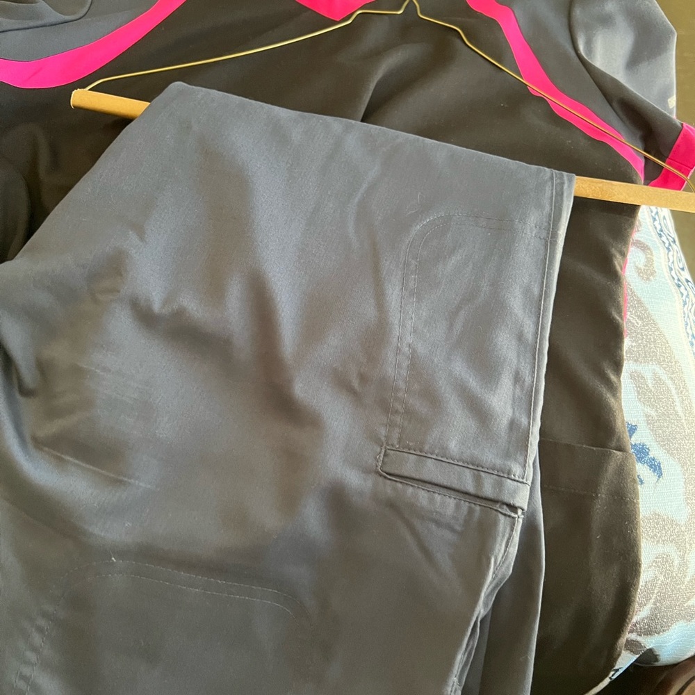 Selling my healthcare uniform in a bundle. Top and pants must be sold together.